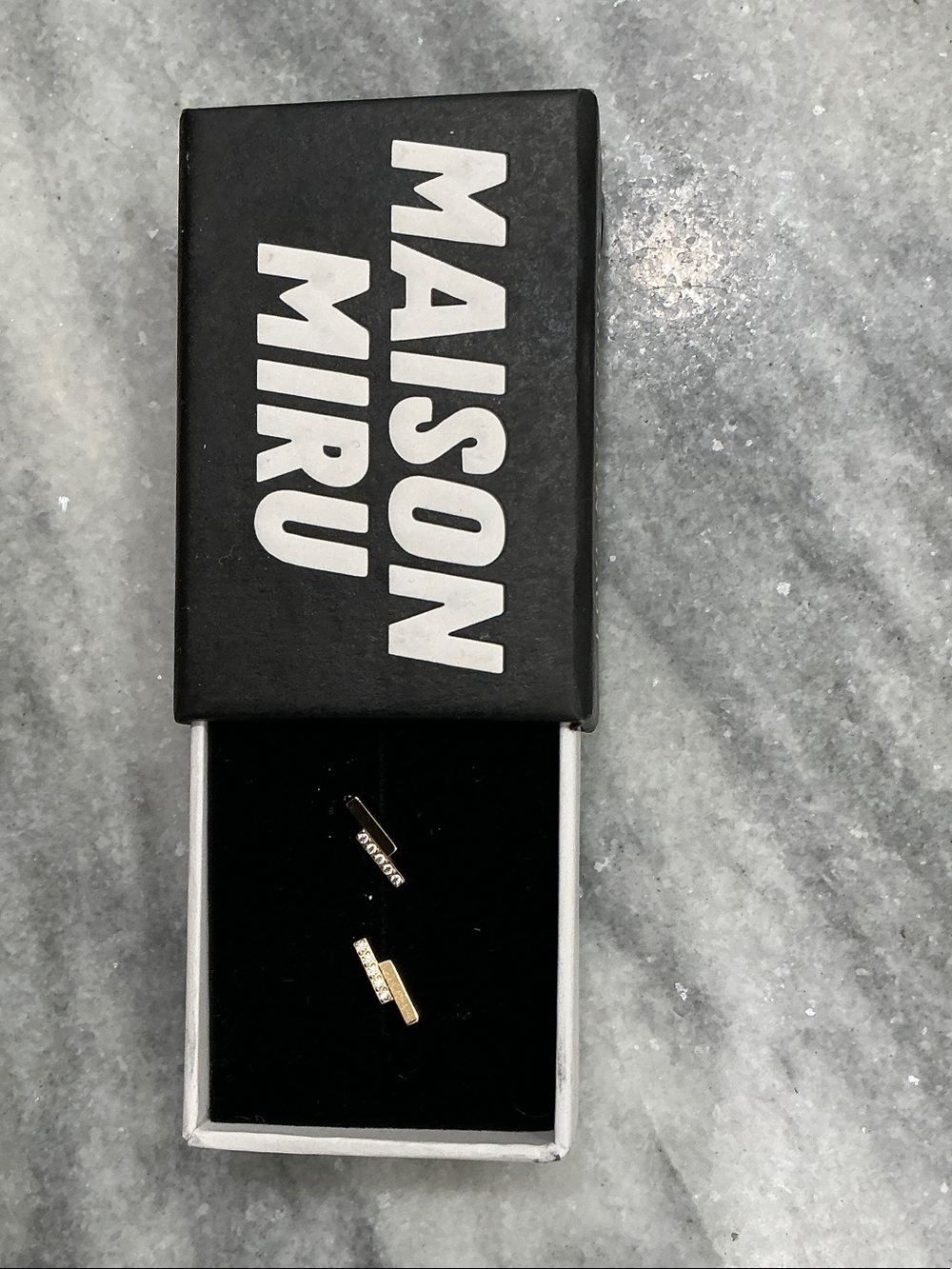 Maison Miru Gold pave lighting bolt nap earrings